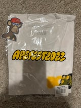 Out Of Focus Tee — sealed in packaging